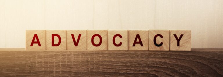 Advocacy Word on Wooden Cubes
